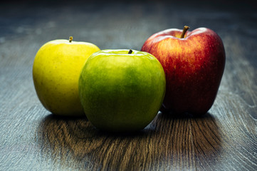 Apples on wooden background