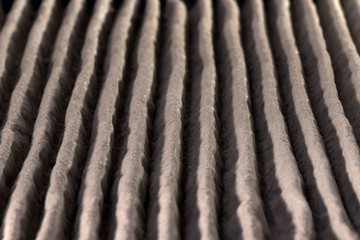 Close up of home air filter showing the dirt and particle cause bacteria inflection and sickness.