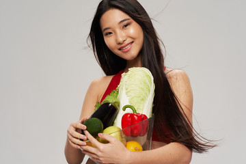 young woman with vegetables