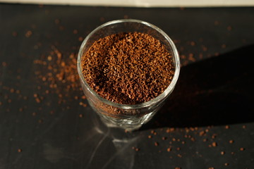 freshly grinded coffee beans about to be consumed 