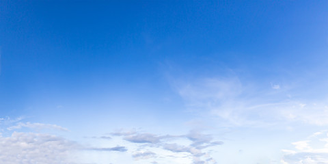 Naklejka na ściany i meble Panorama white fluffy clouds agent blue sky