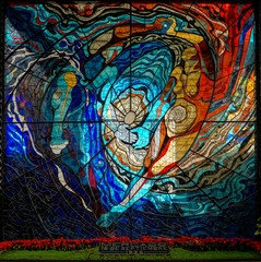 Obraz na płótnie Canvas Vibrant colored circular stained glass