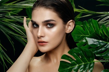 Beautiful woman naked shoulders Exotic tropics clean skin model