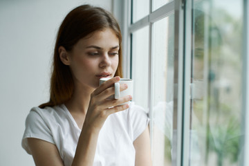 young woman drinking coffee