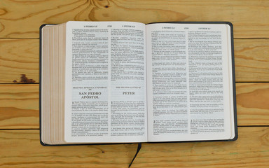 open bilingual bible book on the second letter or Peter, Spanish and english 