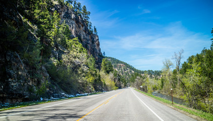 Fototapeta premium A long way down the road of Spearfish Canyon Scenic Byway, South Dakota