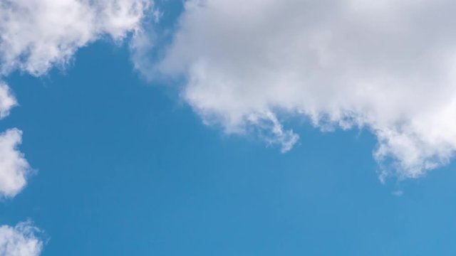 4k timelapse video - Blue sky white clouds background