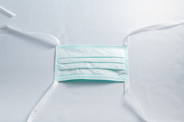 Tie-On Surgical Mask and corona virus protection isolated on a white background, covid-19