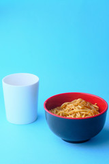 Close up of fresh pasta in a bowl on table.