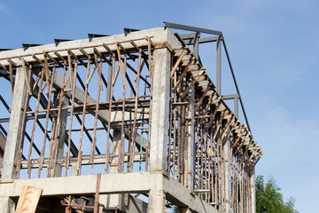 Structure of house wait for complete builidng with blue sky background
