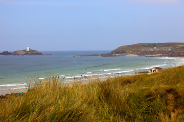 Gwithian Towans (England), UK - August 13, 2015: Rock stack beach at Gwithian Towans, Cornwall,...