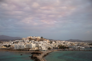 Fototapeta na wymiar Naxos island and a pier in the cyclade