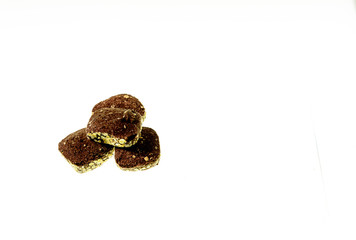 Cookies with chocolate filling isolated against a white background