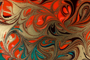 Red and gold abstract paint marble background.