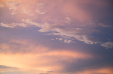 Naklejka na ściany i meble Purple sky at sunset, stratocumulus clouds. Abstract sky