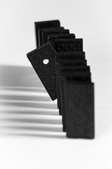 Domino blocks in a row on a white background