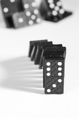 Domino blocks in a row on a white background