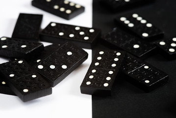 Domino blocks for mind game on a black and whit background