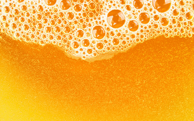 Close up Bubble froth of beer in glass o for background on top view