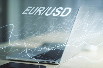Creative EURO USD forex graph sketch on modern laptop background, strategy and forecast concept....