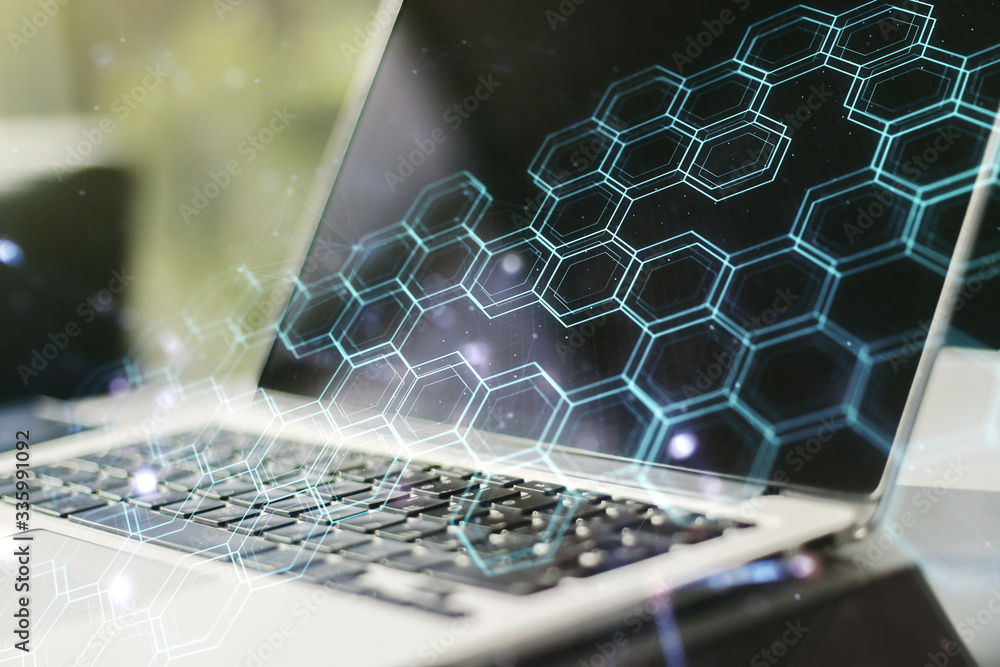 Poster Creative concept of wireless technology with hexagon hologram on modern laptop background. Big data and database concept. Multiexposure