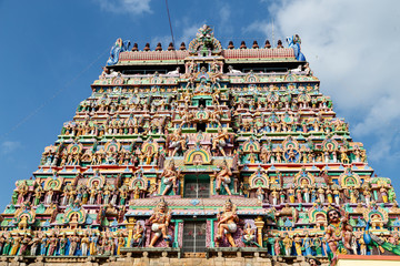 Hindu temple in Tamil Nadu, South India.  Sculptures on Hindu temple gopura (tower), sculpture of...
