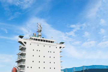 Shipyard The bulk carrier general cargo ship in dry dock yard, navigation bridge deck, recondition...