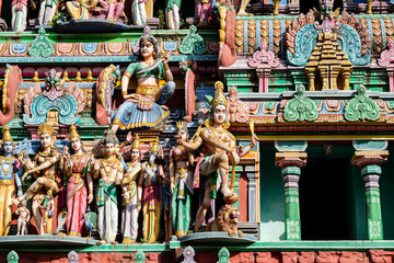 Hindu temple in Tamil Nadu, South India.  Sculptures on Hindu temple gopura (tower)
