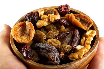 Dried fruits. Dried apricots. Raisins. Walnut. Blueberries. Dried plum.
