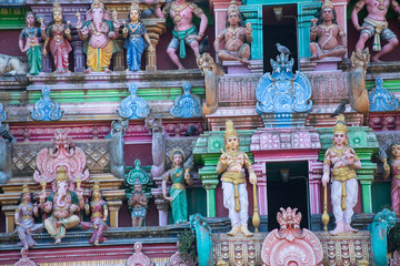 Hindu temple in Tamil Nadu, South India.  Sculptures on Hindu temple gopura (tower)
