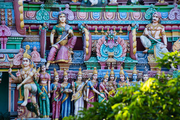 Hindu temple in Tamil Nadu, South India.  Sculptures on Hindu temple gopura (tower)
