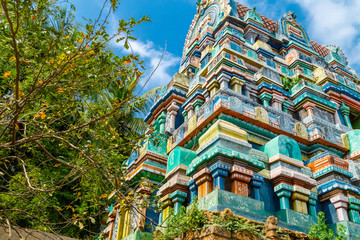 Hindu temple in Tamil Nadu, South India.  Sculptures on Hindu temple gopura (tower)
