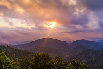 scenic view of sunset over the mountains