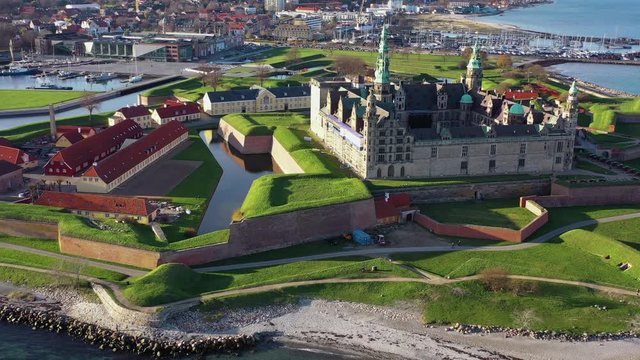 Drone 4K footage of ancient Kronborg Castle in Elsinore in the top of Zeeland Island north of Copenhagen home of Shakespeare's Hamlet (To Be Or Not To Be That is The Question) Denmark Flag Dannebrog