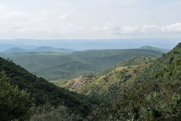 Fototapeta na wymiar Scenic mountain landscapes against sky in rural Kenya, Oloroka Mountain Range, Kajiado, Kenya