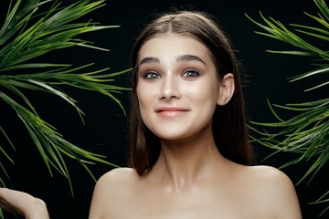 Fototapeta premium beautiful woman green leaves nature rest