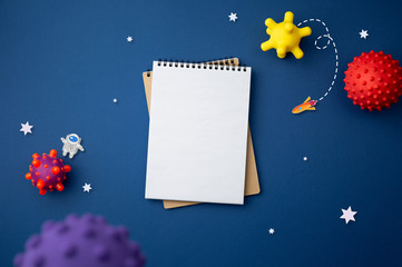 blue background with astronaut, stars and rocket