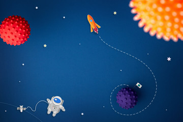 blue background with astronaut, stars and rocket