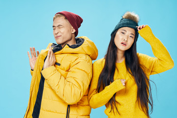 young couple in winter clothes