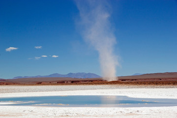 Tornado at the Ojos de Mar close to the town of Tolar Grande in Puna, Argentina