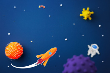 blue background with astronaut, stars and rocket