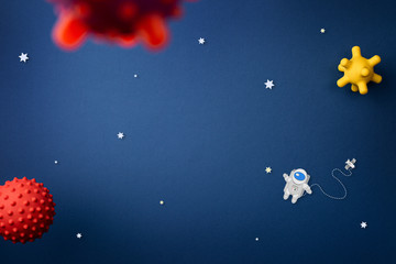 blue background with astronaut, stars and rocket