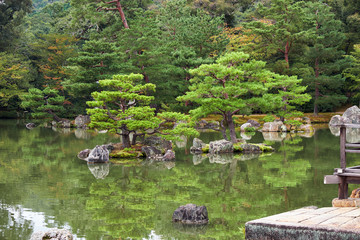 Fototapeta na wymiar Tsuru-jima and Kame-jima islands on the Kyoko-chi pond. Kinkaku-ji temple. Kyoto. Japan