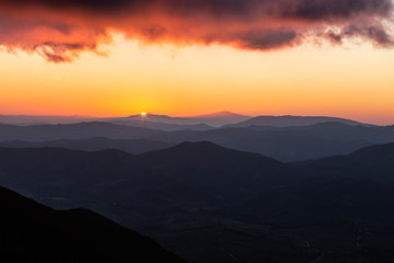 Sunset over mountains and valley