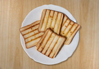 Toasted sliced bread, seasoned with olive oil