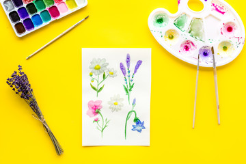Watercolor painting. Picture with flowers, paints, palette on yellow background top-down