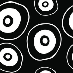 Seamless pattern of white circles on black background. Abstract modern vector illustration.