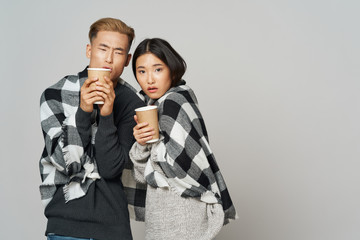 young man and woman with microphone