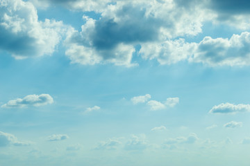 sunlight through cloud on blue sky