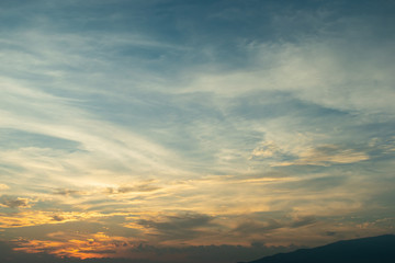 sunlight through cloud on dramatic sunset sky
